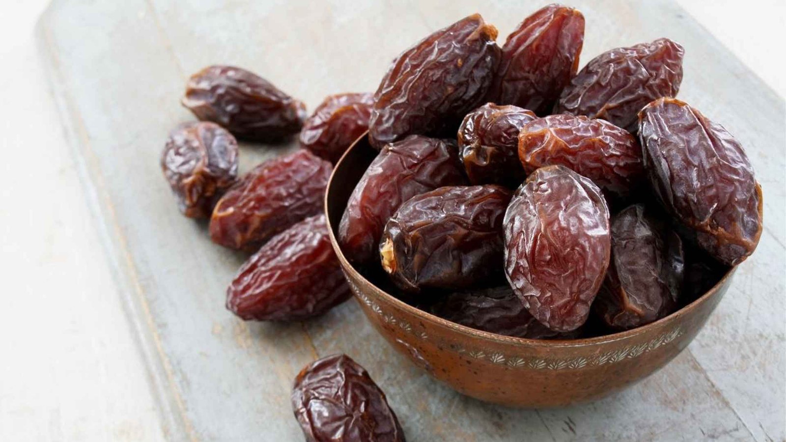 Omani dates in a traditional setting, emphasizing their role in Omani culture.